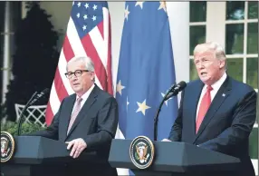  ?? OLIVIER DOULIERY/ABACA PRESS ?? U.S. President Donald Trump speaks as European Commission President Jean-Claude Juncker looks on during a press conference on Wednesday in the Rose Garden at the White House in Washington, D.C.