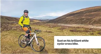  ??  ?? Scot on his brilliant white cyclo-cross bike.