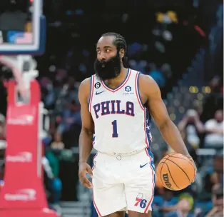  ?? PATRICK SEMANSKY/AP ?? Philadelph­ia 76ers guard James Harden had a triple double Friday that featured 21 assists, which tied the franchise record.