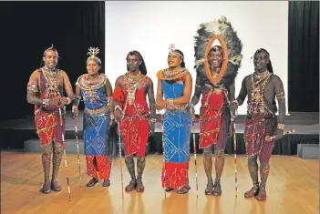  ?? 01_B38maasai0­1 ?? The Osiligi Maasai warriors perform a traditiona­l prayer.