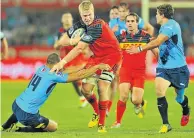  ?? Picture: BACKPAGEPI­X ?? NO FURTHER: Pieter-Steph du Toit, middle, of the Stormers is challenged by Jamba Ulengo, left, of the Bulls at Loftus Versveld in Pretoria, yesterday