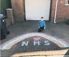  ??  ?? Harry and his rainbow artwork.