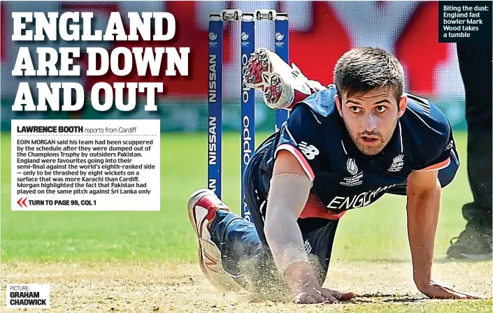  ?? PICTURE: GRAHAM CHADWICK ?? Biting the dust: England fast bowler Mark Wood takes a tumble