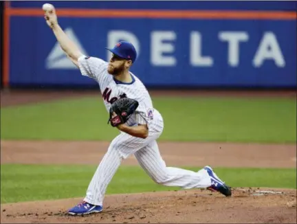  ?? FRANK FRANKLIN II — THE ASSOCIATED PRESS ?? Mets starting pitcher Zack Wheeler delivers pitch during 12-1 loss to Blue Jays, Wednesday at Citi Field.