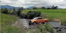  ??  ?? The 4WD trek includes several pretty river crossings.