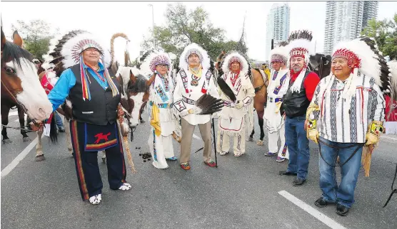  ?? DARREN MAKOWICHUK ?? Parade Marshals from left, Chief Lee Crowchild-Tsuut’ina Nation, Chief Aaron Young-Chiniki First Nation, Chief Joseph Weasel Child-Siksika Nation, Chief Darcy Dixon-Bearspaw First Nation, Chief Roy Fox-Kainai/Blood Tribe, Chief Stanley (Stan) C....