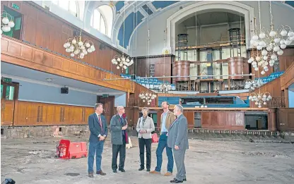  ?? Picture: Angus Findlay. ?? Stephen Crawford, second left, the council’s head of property, leads the tour with MSPs Murdo Fraser and Liz Smith and councillor­s Dave Doogan and Murray Lyle.