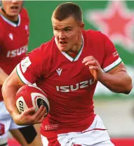  ??  ?? Breakthrou­gh: Shane Lewis-Hughes with Wales
