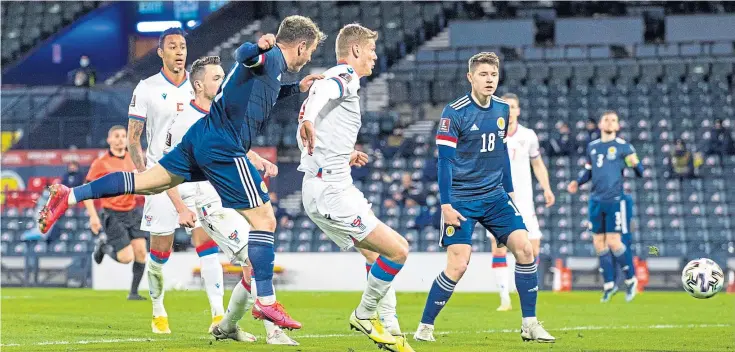  ??  ?? NUMBER FOUR: Ryan Fraser rounds off a fine night for Steve Clarke’s Scotland with the fourth goal in a convincing World Cup qualifying victory over the Faroe Islands.