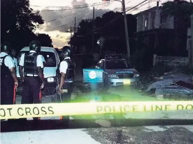  ?? FILE ?? Police at a crime scene in Glendevon, St James.