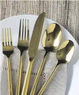  ?? JENNIFER CHASE/THE WASHINGTON POST ?? Raise the bar with real plates, glasses, silverware and napkins — or, for a less expensive option, disposable wooden cutlery comes in an assortment of shapes and sizes.