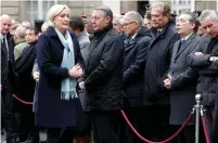  ?? (Philippe Wojazer/Reuters) ?? NATIONAL FRONT presidenti­al candidate Marine Le Pen attends a ceremony for a slain police officer yesterday in Paris.