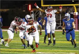  ?? NICK GRAHAM PHOTOS / STAFF ?? Lakota West running back Cameron Goode carries the ball during the Firebirds’
Division I regional semifinal last Friday against St. Xavier at Princeton High School’s Pat Mancuso Field. Lakota West won 12-2.