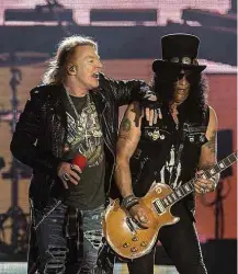  ?? Ricardo Borges/Folhapress ?? Axl Rose e Slash no show do Guns no sábado, no Rock in Rio