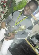  ?? (Photos: Rosalee Wood Condell) ?? Gabre Samuels shows off his trophy and medals from National Finals in previous years.