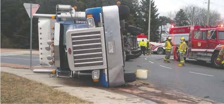  ?? Steve Kannon ?? Southbound traffic was blocked between Elmira and St. Jacobs Tuesday evening after a transport truck carrying steel coils tipped over at the roundabout. Emergency crews responded to the scene just Ȼɟɿ́̿ɟ ڂ ԋյԉԅ ڂ̵ձ˪ձ ڂ Ɨʎɟ ڂ ԊԏՈΰɟǵ̿Ո́ˍɎ ڂ˪ǵˍɟ ڂ Ɏ̿ʡΞɟ̿ڂ́ɿ ڂͮʎɟ ڂͮ̿ͽɂ˅ڂ ΢ǵ͝ڂͮ̿ǵ˱̵́̿ͮ͝ɟɎ ڂ́ͮڂ ʎ̵́͝ʡͮǵˍڂ ΢ʡͮʎ ڂ˱́˱ՈˍʡɿɟՈͮʎ̿ɟǵͮɟ˱ʡ˱ʄ ڂ ʡ˱ʽͽ̿ʡɟ͝ձ ڂ Ɨʎɟ ڂ̿́ͽ˱ɎǵȻ́ͽͮڂ ΢ǵ͝ڂ ɂˍ́͝ɟɎ ڂ ɿ́̿ڂ͝ɟΞɟ̿ǵˍڂ ʎ́ͽ̿͝ڂ ΢ʎʡˍɟ ڂ ʡ˱Ξɟͮ͝ʡʄǵͮ́̿͝ڂ̿ɟ˪ǵʡ˱ɟɎ ڂ́˱ڂ͝ɂɟ˱ɟ ڂ and crews attempted to right the vehicle. The Traffic Service’s Branch continues to investigat­e the incident. Charges are pending.