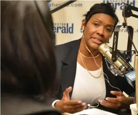  ?? CHRIS CHRISTO / HERALD STAFF ?? SEARCHING FOR ANSWERS: Mary Franklin, right, whose husband’s homicide in 1996 has never been solved, questions Suffolk District Attorney Rachael Rollins on Herald Radio yesterday.