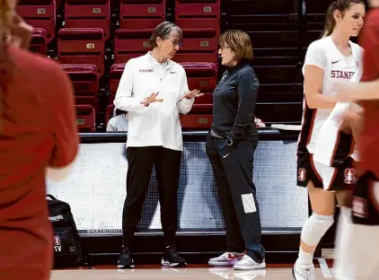  ?? Stephen Lam/The Chronicle ?? Stanford head coach Tara VanDerveer, left, said having charter flights for her women’s basketball team once the Cardinal move to the ACC will be important for the team’s success.