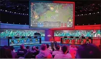  ??  ?? BOOMING: Computer games fans are paying to watch the top e-sports players