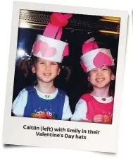  ??  ?? Caitlin (left) with
Emily in their Valentine’s Day
hats