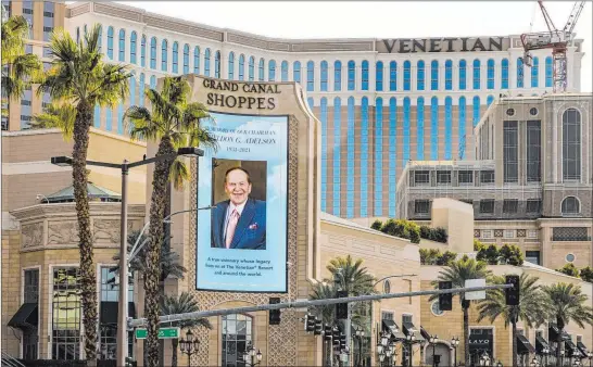  ?? L.E. Baskow Las Vegas Review-journal @Left_eye_images ?? The marquee at Grand Canal Shoppes at The Venetian pays tribute Tuesday to Las Vegas Sands Corp. Chairman and CEO Sheldon Adelson, who died Monday night.