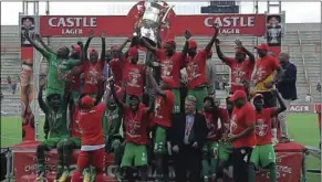  ??  ?? FC Platinum players and officials celebrate after winning the Castle Challenge Cup at Barbourfie­lds Stadium on March 14