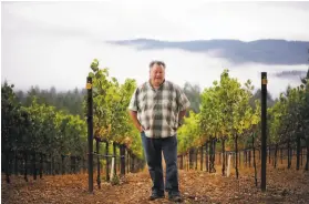  ?? Erik Castro / Special to The Chronicle 2011 ?? Burt Williams, the late cofounder of Williams Selyem Winery, at his vineyard in 2011. He and Ed Selyem sold their winery to the Dyson family in 1998.