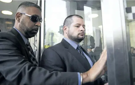  ?? MICHELLE SIU/CANADIAN PRESS ?? Const. James Forcillo, right, arrives at a Toronto courthouse on Thursday to be sentenced for the attempted murder of 18-year-old Sammy Yatim in 2013.