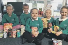  ??  ?? FOOD DONATIONS From left: Gracie-Anne Blythe, Jack Ellis, Jared Brock, Khaleesi Mullineaux and Rebecca Lea, all aged 6.