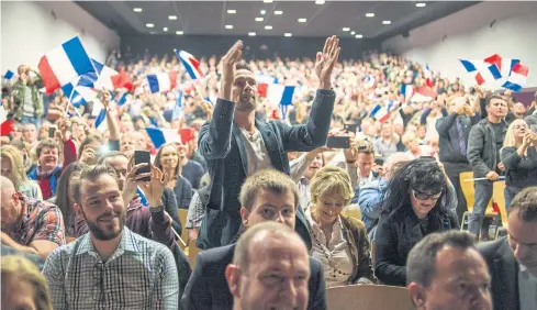  ?? THE NEW YORK TIMES ?? A rally for Marine Le Pen in Monswiller, France, on April 5. Polarisati­on is driving once-centrist voters towards more extreme parties.