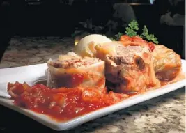  ?? CARLINE JEAN/SUN SENTINEL ?? Sweet and sour stuffed cabbage rolls at 3 G’s Gourmet Deli in Delray Beach is a family recipe that has been a menu staple for over two decades.