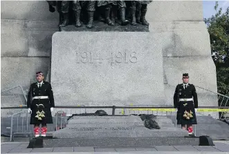  ??  ?? 9:53:38 a.m. The last known picture taken of Cpl. Nathan Cirillo before he was shot while standing guard at the National War Memorial on Oct. 22, 2014 was captured seconds before the shooting began by a French tourist waiting nearby for a tour bus....