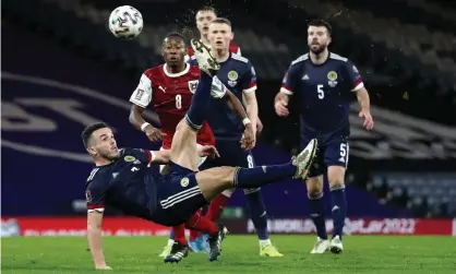  ?? Photograph: Jan Kruger/UEFA/Getty Images ?? Scotland’s John McGinn scores his spectacula­r late equaliser against Austria.