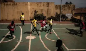  ?? Finbarr O’Reilly/The New York Times/eyevine ?? Patients play football, which was introduced as part of an effort to add therapeuti­c options, at the Sierra Leone Psychiatri­c Hospital in Freetown, Sierra Leone. Photograph: