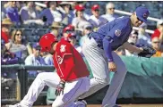  ?? ROSS D. FRANKLIN / ASSOCIATED PRESS ?? Reds shortstop Jose Peraza (left, sliding into third base with a triple Thursday in Goodyear, Ariz.) is batting .563 this spring and drawing praise from manager Bryan Price.