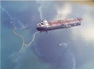  ?? JOHN GAPS III/THE CANADIAN PRESS ?? Crude oil from the tanker Exxon Valdez swirls on the surface of Alaska’s Prince William Sound on April 9, 1989. Coastal First Nations says a similar spill on the B.C. coast would cost $24 billion to clean up.