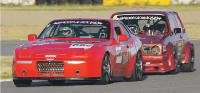  ?? Picture: Paul Bedford ?? VARIETY. Harry Arangies (Stradale Porsche 944) and Geoff Dalton ( XTra Shoes Golf Turbo) exchange blows during the Phakisa 200 race in the Free State. Arangies won.