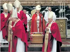  ?? FRANCO ORIGLIA/GETTY IMAGES ?? Pope Francis, centre, attends the funeral for disgraced U.S. Cardinal Bernard Law at St. Peter’s Basilica Thursday in Vatican City. Instead of going to police, Law moved priests who sexually assaulted children to other parishes.