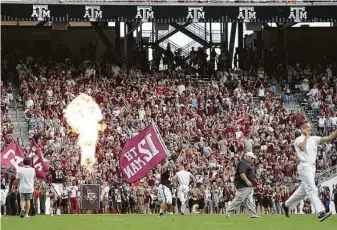  ?? Sam Craft / Associated Press ?? Texas A&M is scheduled to host Abilene Christian in its Sept. 5 season opener at Kyle Field. If that game were this week, the stadium would be allowed about 51,000 fans — half its capacity.