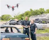  ?? JOE PHELAN/THE KENNEBECJO­URNAL2017 ?? A Maine State Police drone hovers in Augusta, Maine. A measure in Congress would affect government purchases of Chinese drones.