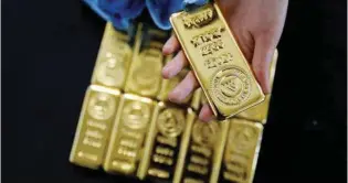  ?? - Reuters file picture ?? NOT LOSING SHINE: Gold is likely to remain within a range of $1,300-$1,340 in the short term as the dollar remained weak.