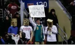  ?? Associated Press ?? A fan holds up a sign to celebrate after the Sixers snapped a 26-game losing streak against the Detroit Pistons at the Wells Fargo Center Saturday night. The win was their first at home since Jan. 15.