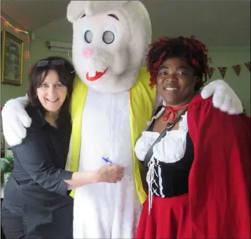  ??  ?? Mary Rooney,’Roger Rabbit’ and ‘Little Red Riding Hood’ Favour Maggs at the Fairy Family Fun Day at Stephensto­wn Pond.