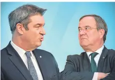  ?? FOTO: DPA ?? Markus Söder (l.) und Armin Laschet buhlen um die Kanzlerkan­didatur.