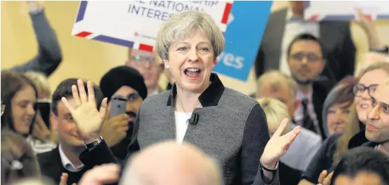  ?? CHRIS RADBURN ?? Theresa May speaking at Netherton Conservati­ve Club in Dudley, West Midlands, during the Conservati­ve Party’s election campaign on Friday