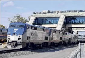  ?? Will Waldron / Times Union ?? Locomotive­s for Amtrak's Lake Shore Limited service to Boston wait for departure after stopping at the Albany-rensselaer rail station Monday.