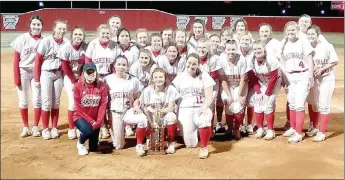  ?? MARK HUMPHREY ENTERPRISE-LEADER ?? The Farmington softball team displays the second place trophy from the Farmington Invitation­al Softball tournament they hosted Friday and Saturday. The Lady Cardinals lost in the championsh­ip 8-2 to Bentonvill­e West after wins over North Little Rock (11-1), Fayettevil­le (9-1) and Gravette (3-2).