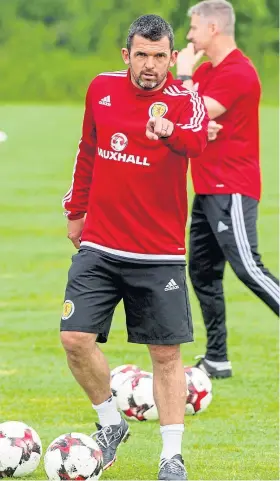  ??  ?? SCOTLAND MAN: Callum Davidson playing for his country in a 1999 European Championsh­ip qualifying win against Lithuania, left, and helping to coach the national team in 2017.