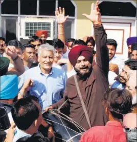  ??  ?? Congress candidate Sunil Jakhar celebratin­g his victory along with Punjab cabinet minister Navjot Singh Sidhu (with dhol) and other party leaders in Gurdaspur on Sunday.