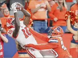  ?? Joshua Bessex / Associated Press ?? Clemson wide receiver Joseph Ngata (10) makes a touchdown catch while defended by Syracuse defensive back Darian Chestnut during the second quarter of a NCAA football game in Syracuse on Friday night.